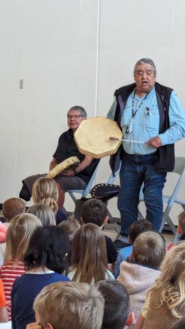 Brother Rick drumming at naming celebration