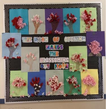 A bulletin board of student art work